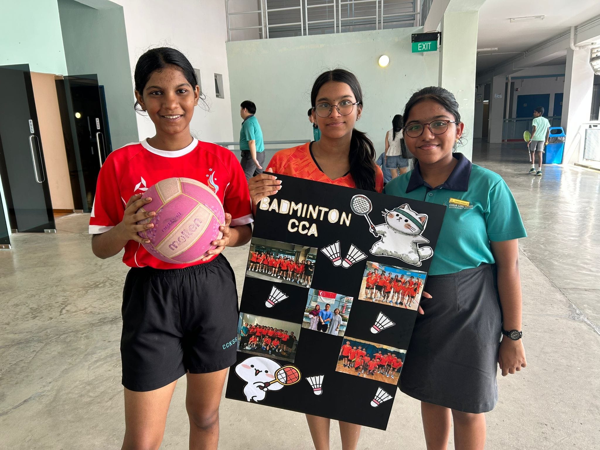 3 girls advertising the netball cca